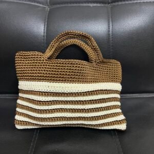 brown and white crochet purse