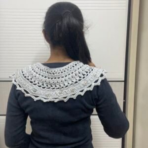 Metallic silver poncho with adjustable strings and tassels